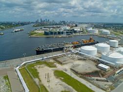 Aerial view of Port Tampa Bay showing cargo terminals, fuel storage tanks, liquid bulk facilities, and ships supporting global trade and logistics. Aerial view of Port Tampa Bay showing cargo terminals, fuel storage tanks, liquid bulk facilities, and ships supporting global trade and logistics.