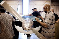 Students get hands-on experience in the aviation systems technology program at Guilford Technical Community College's Aviation Center.