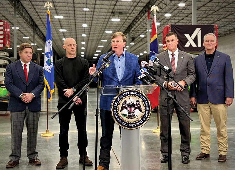 Governor Reeves is joined by MDA Executive Director Bill Cork (far right), Southaven Mayor Darren Musselwhite (second from right) and xAI representatives during the announcement of xAI's $20 billion investment in North Mississippi.